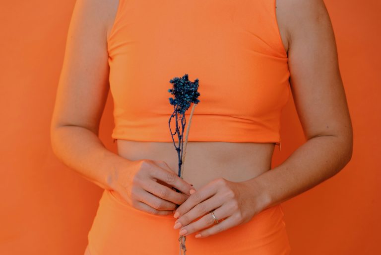 Woman with a dead flower.